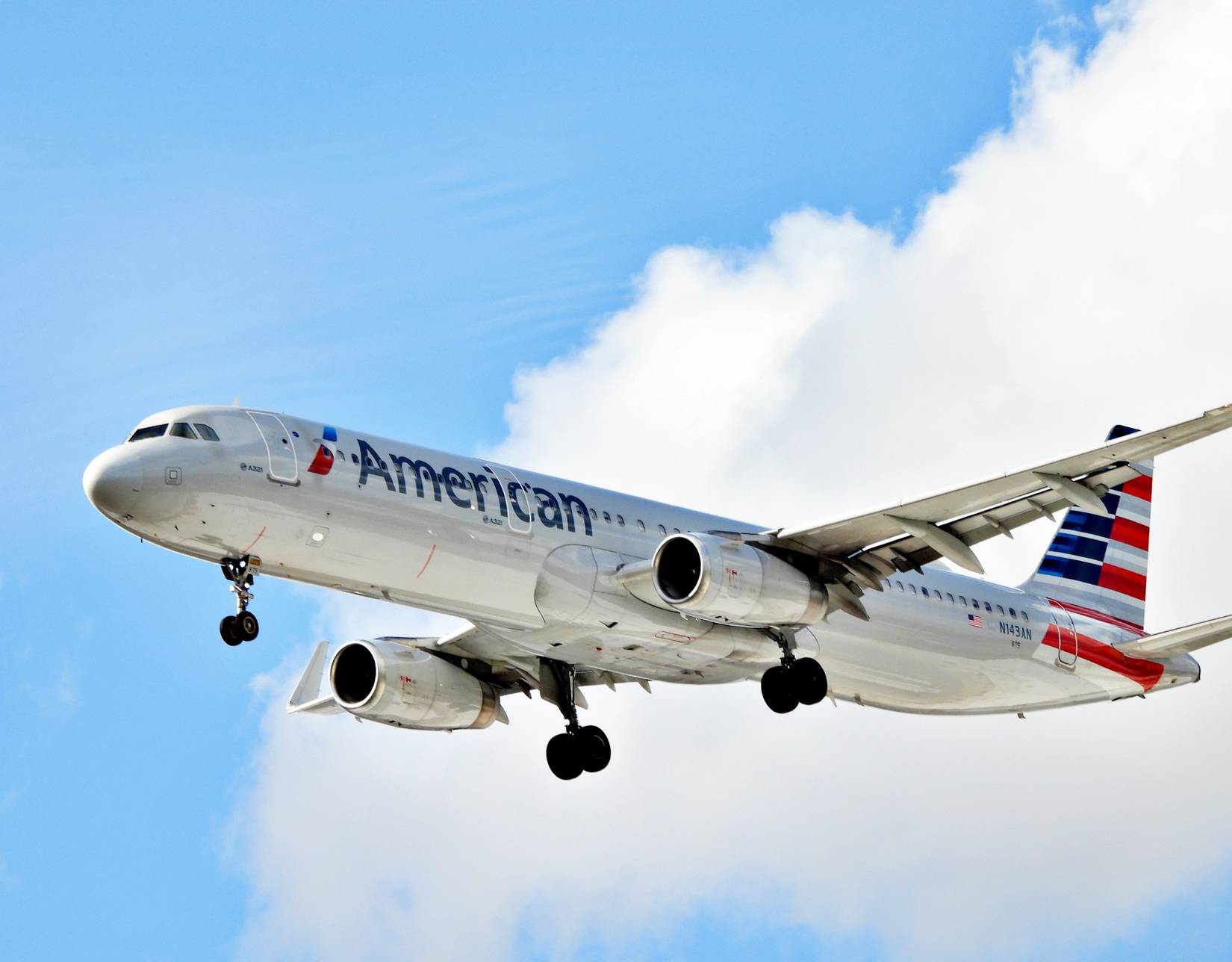 American Airlines plane landing at DJT airport