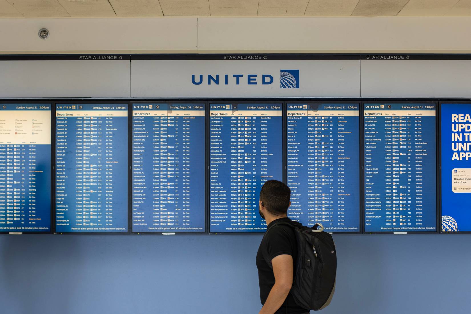 United Airlines flight board at a U.S. airport