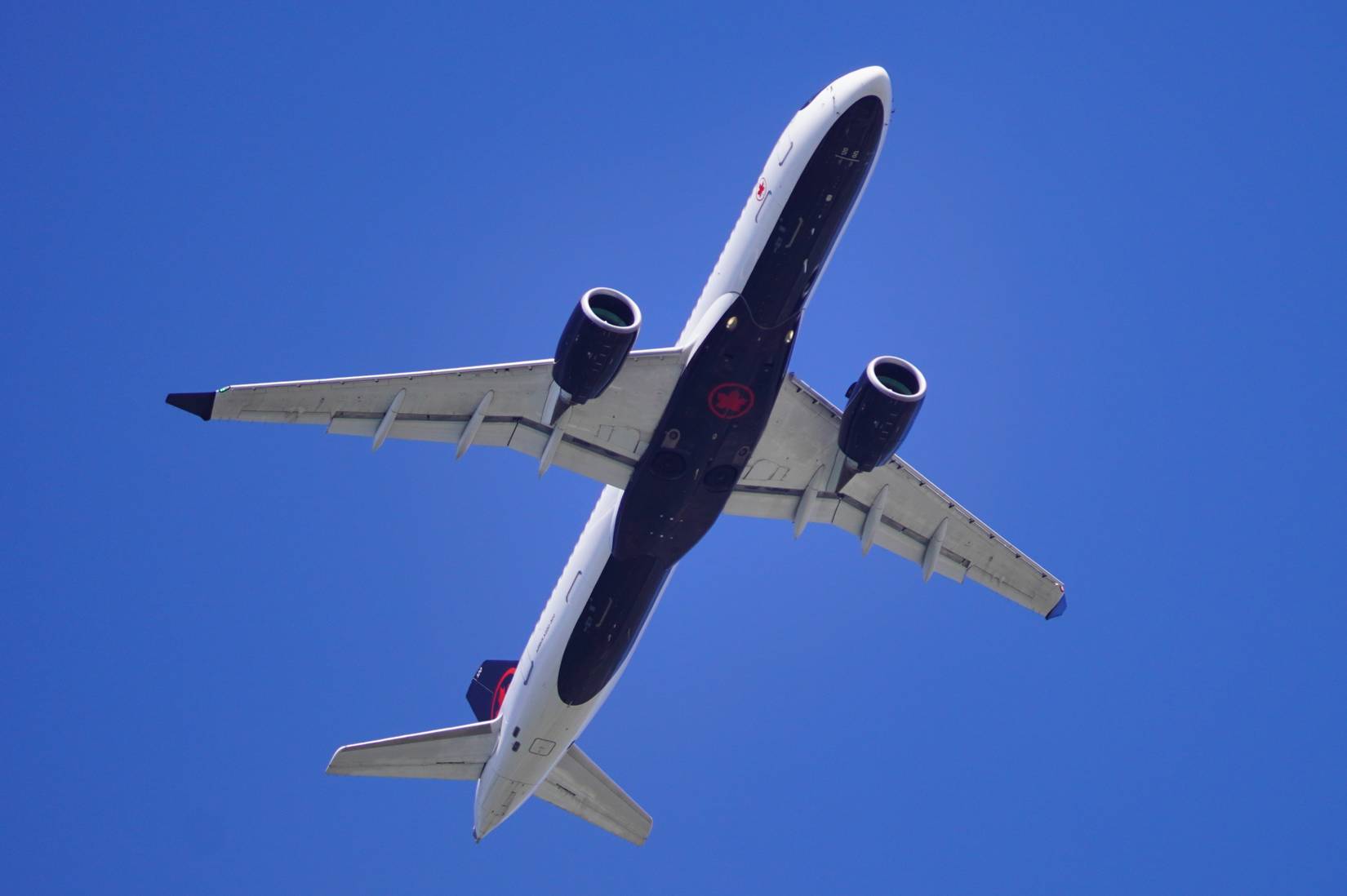 Air Canada aircraft flying at George Bush Intercontinental Airport (IAH) in Houston, Texas, TX, USA