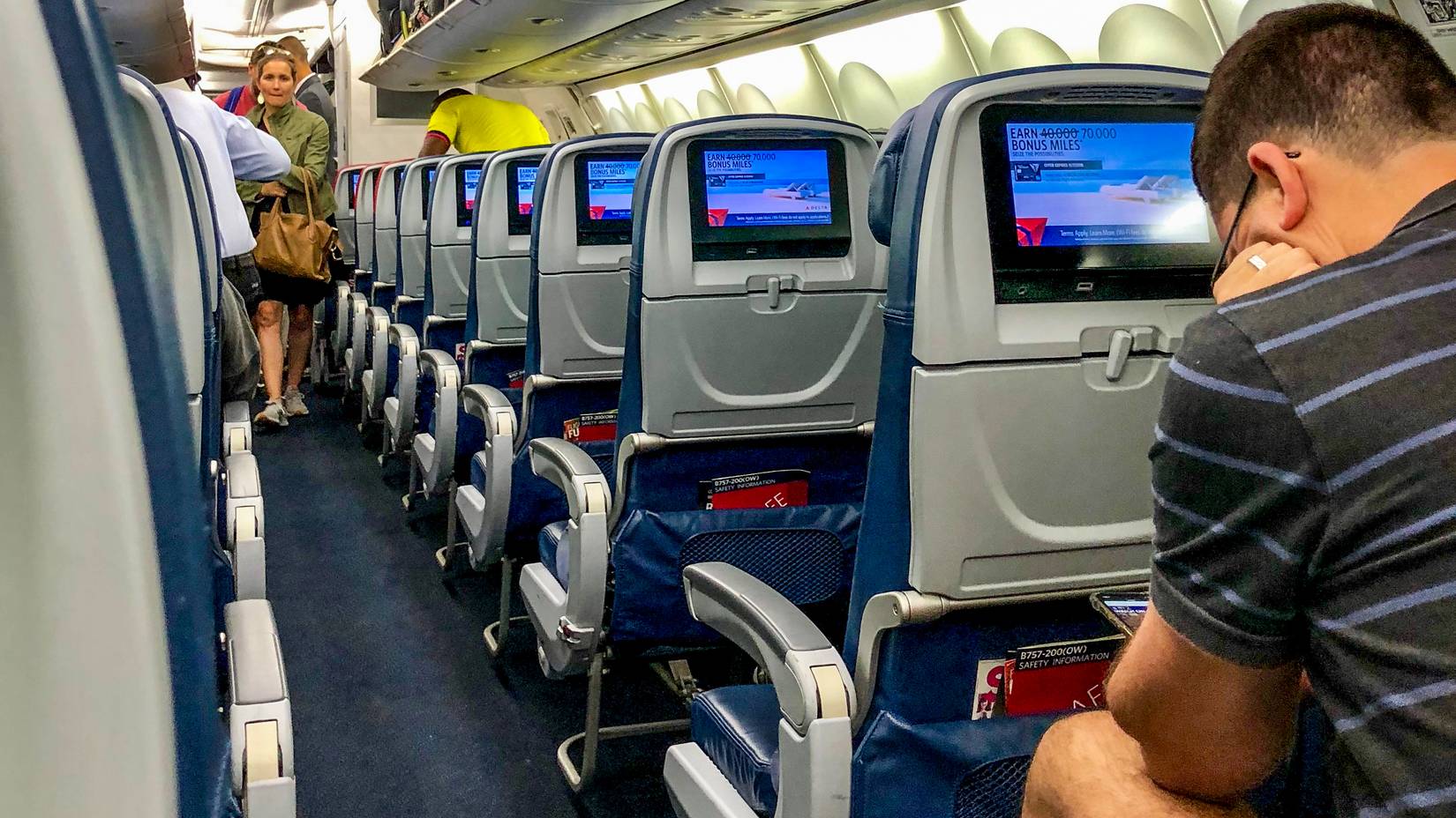 Delta Air Lines Passenger Removed From Flight After Refusing To Give ...