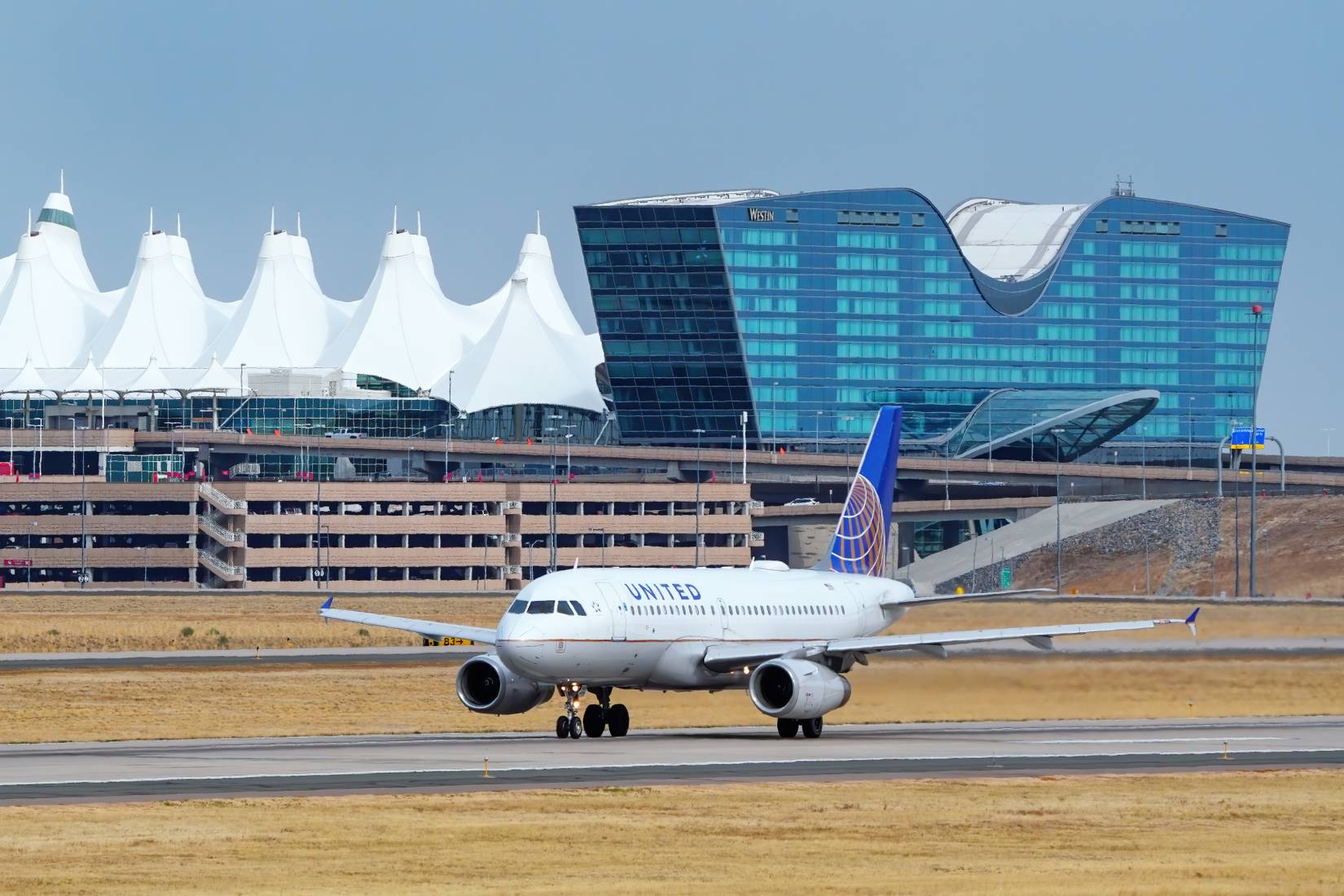United Airlines plane taxiing at Denver International Airport, Colorado