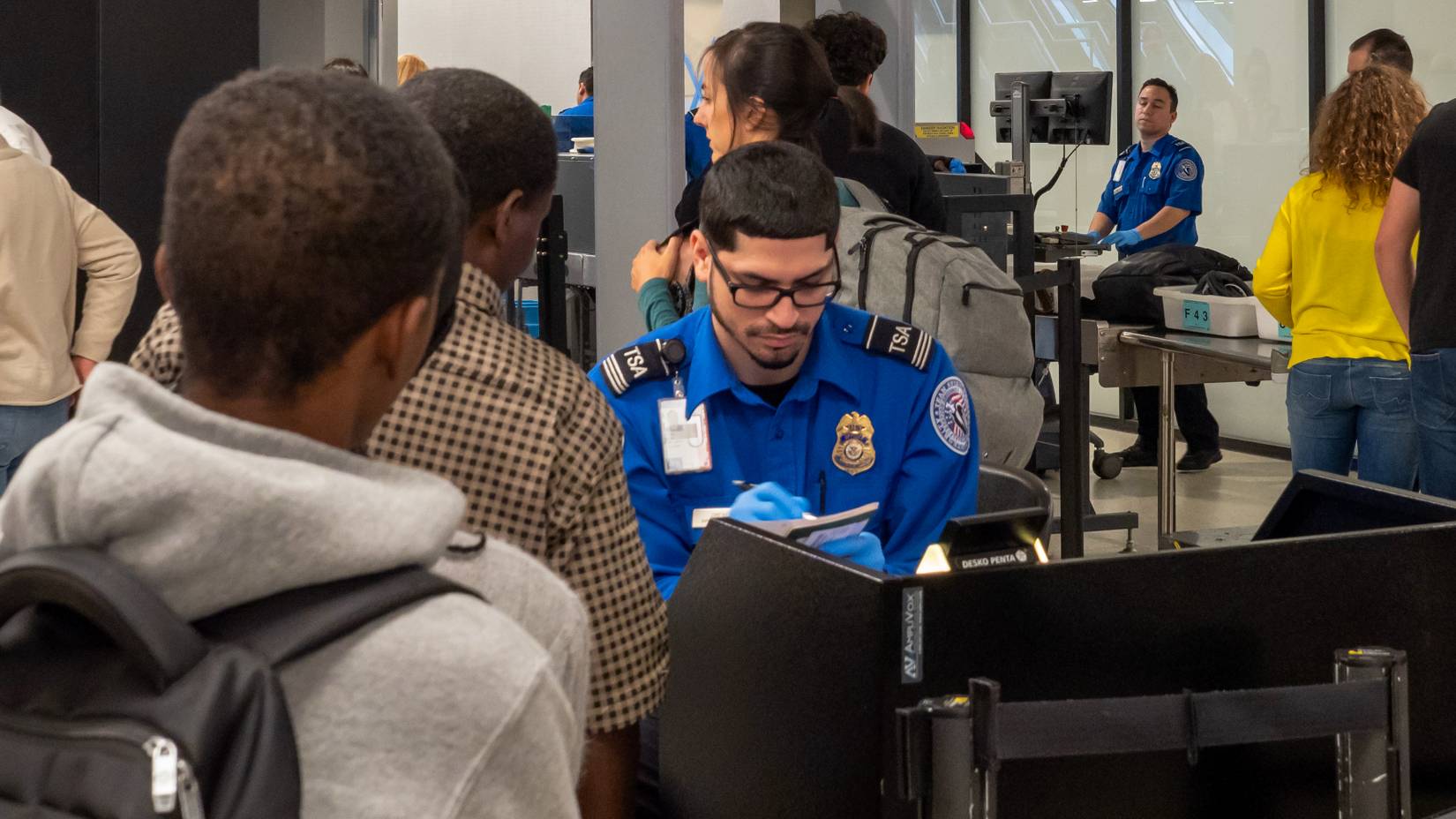 Travelers at a Transportation Security Administration (TSA) queue at a U.S. airport