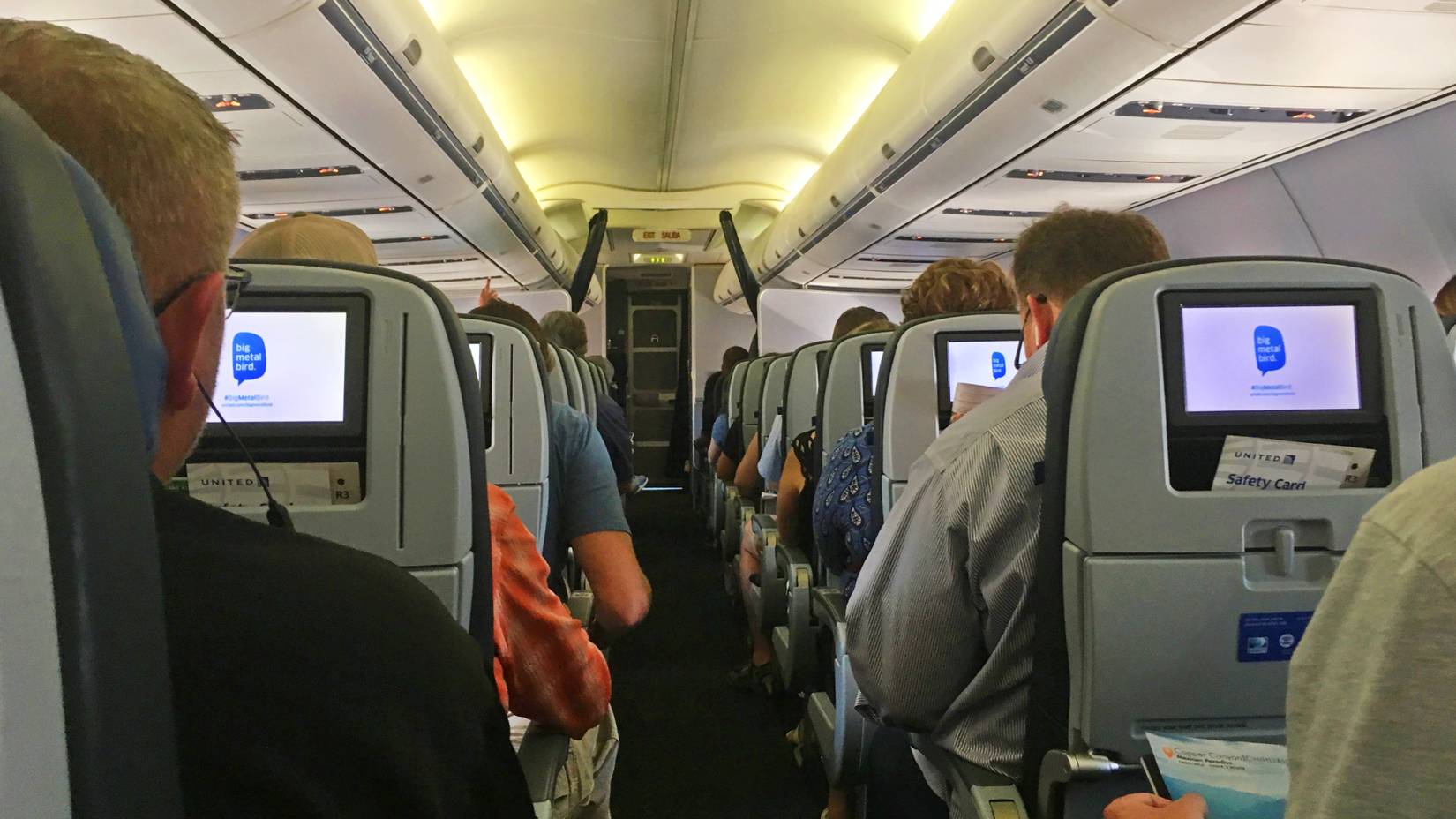 Passengers waiting for take off on a United Airlines flight at Newark Liberty International Airport (EWR) in New Jersey, USA